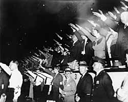 Nazi supporters in Los Angeles give the Hitler salute at a rally opposing the boycott of German goods. May 1934.