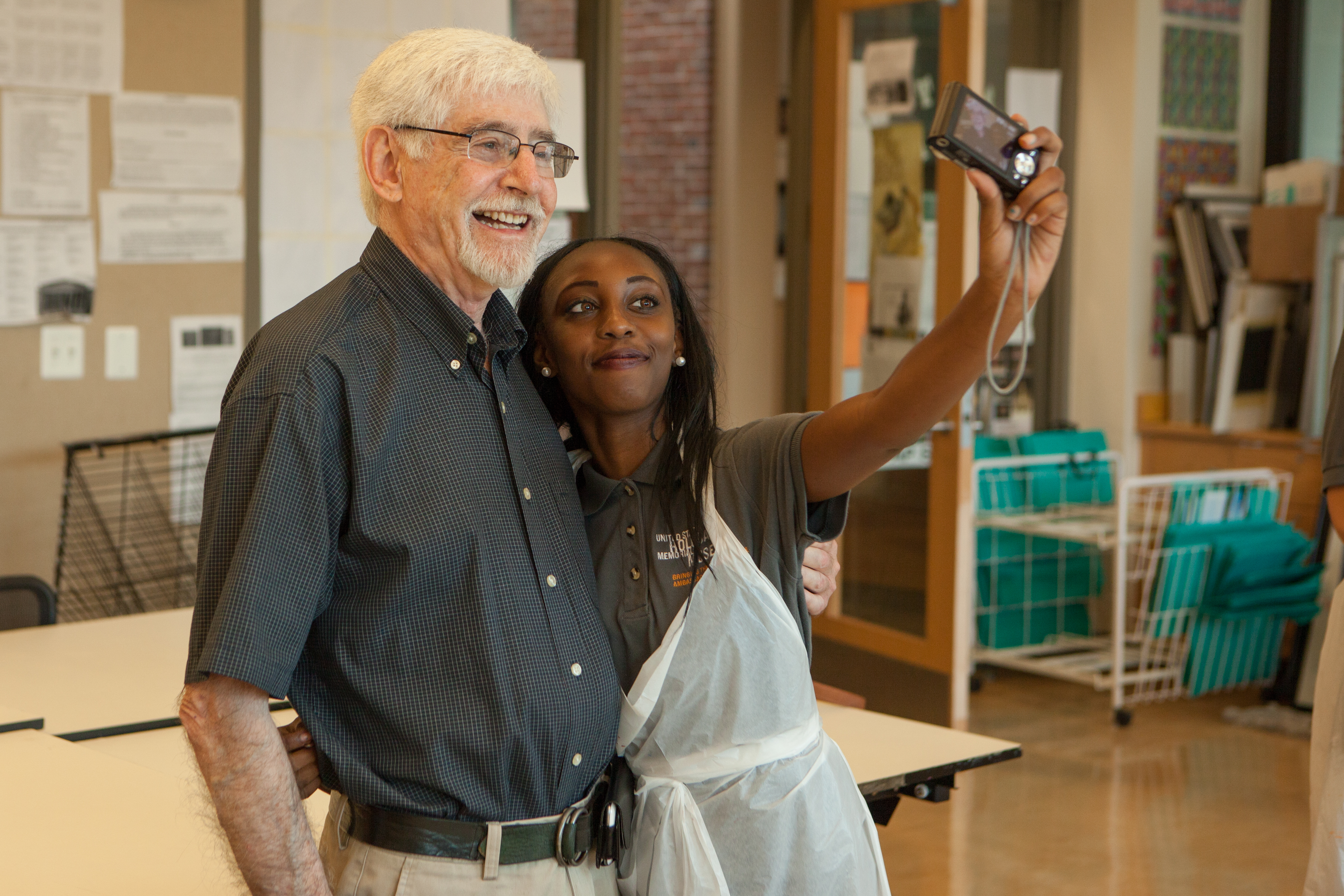 Two people pose for a picture