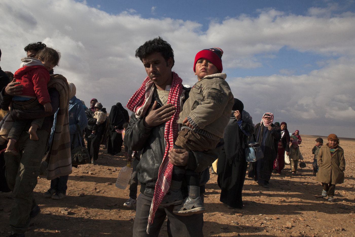 Refugees crossed into Jordan from Syria at a border crossing known as Al Hadalat, on the far eastern part of the border. Many of the refugees hail from Dara’a and were fleeing heavy fighting. February 2014.