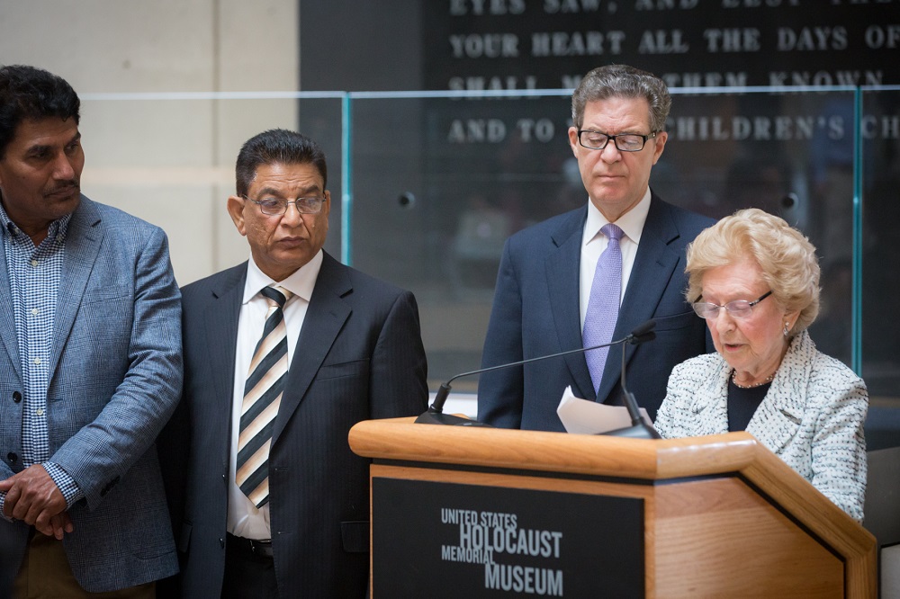 Irene Weiss delivers remarks alongside Ambassador Brownback and survivors of religious persecution.