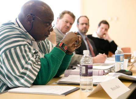 Violence seminar at the U.S. Holocaust Memorial Museum sponsored by the Committee on Conscience. Maina Kiai presents to the group.