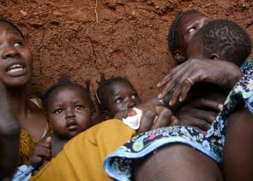 Women and children take shelter