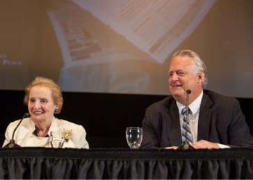 Madeleine K. Albright and Richard S. Williamson, co-chairs of the Working Group on the Responsibility to Protect, speak at a July 2013 symposium.