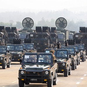 Military personnel participates in a parade on Armed Forces Day in Naypyitaw, Myanmar, March 27, 2021. 