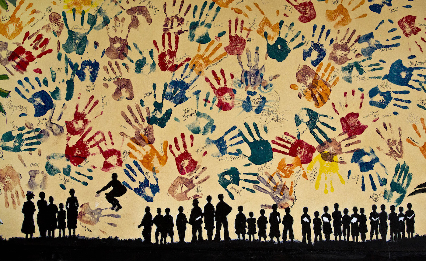 A mural created by the students who reside at the school is seen on the wall of the cafeteria at the Agahozo-Shalom Youth Village near Rwamagana, in Rwanda. 