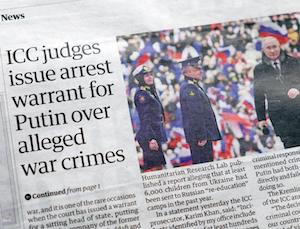 ICC judges issue arrest warrant for Putin over alleged war crimes' Guardian newspaper headline Russia Ukraine war article on March 18, 2023. London, UK.