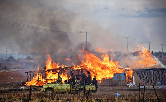 The town of Abyei is looted and burned following its takeover by Sudanese Government forces. UN photo/Stuart Price/May 2011.