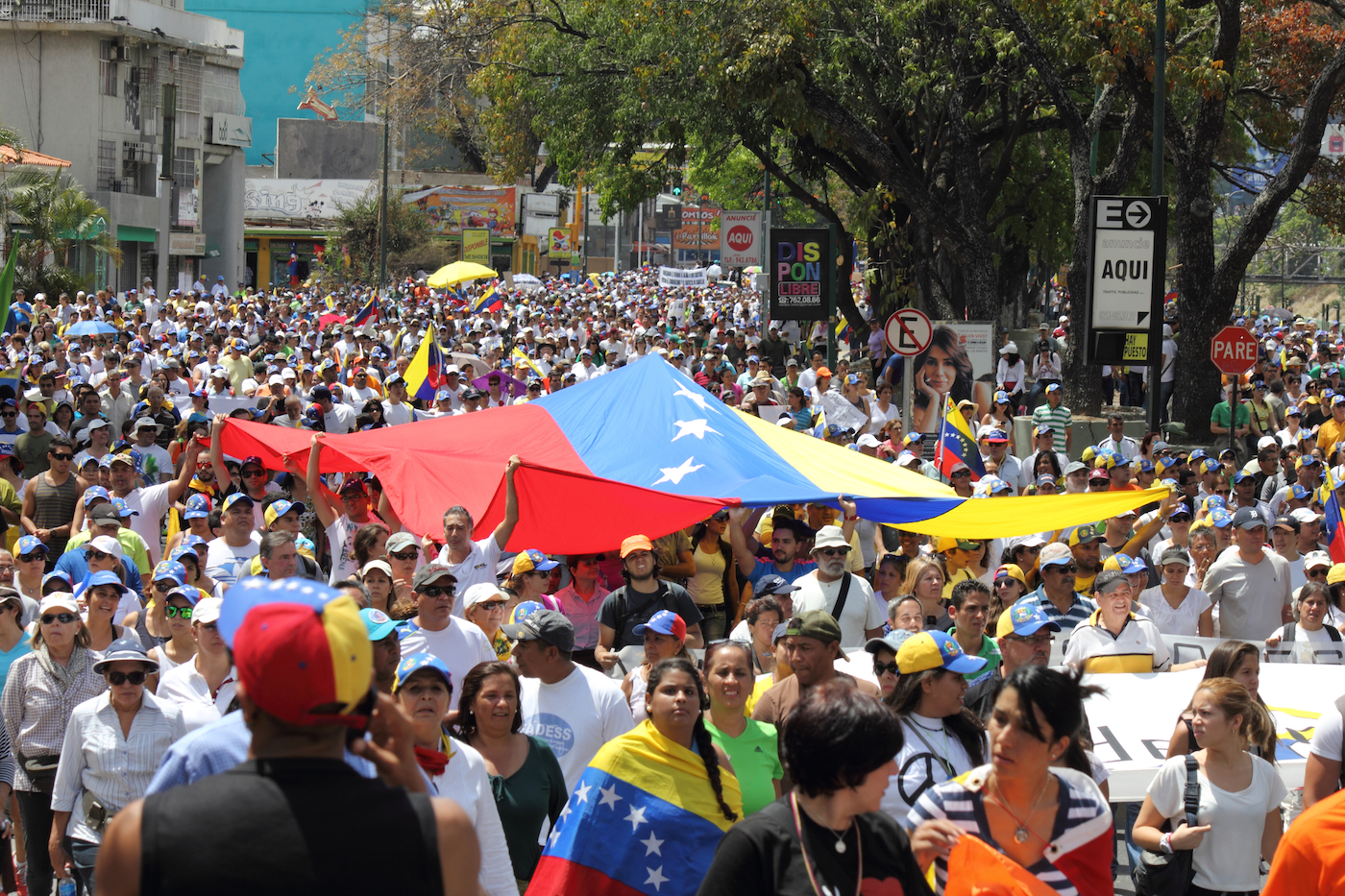 Venezuelans protest in the street against the government for human rights violations and killings of civilians in peaceful demonstrations. March 16, 2014.