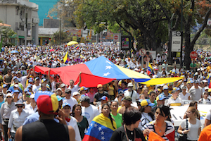 Venezuelans protest in the street against the government for human rights violations and killings of civilians in peaceful demonstrations. March 16, 2014.